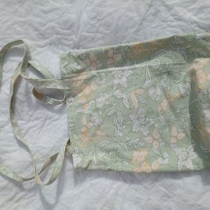 green tote bag with light prints