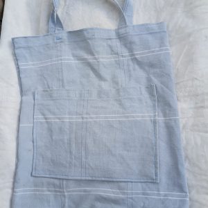 blue tote bag with two outer pockets